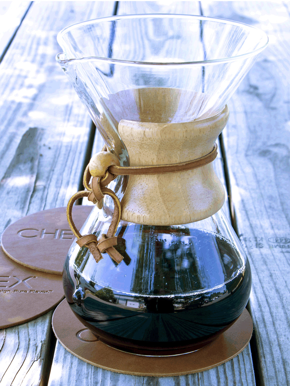 5.75" Leather Coaster with a coffeemaker sitting on it