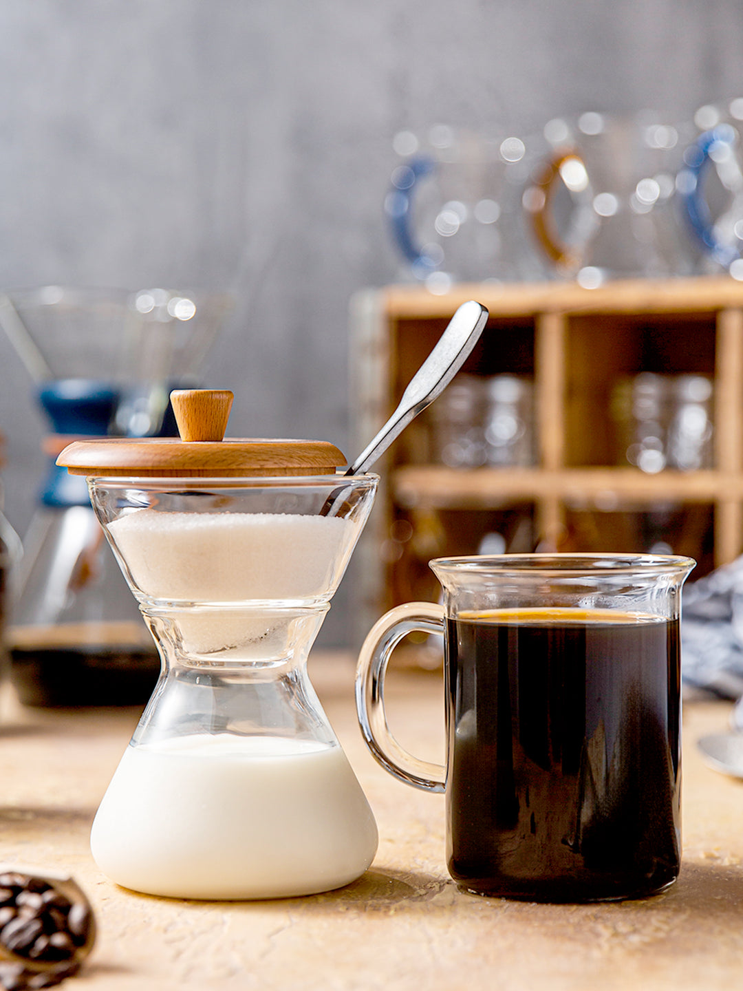 Cream and sugar set next to the Murray mug on a counter top