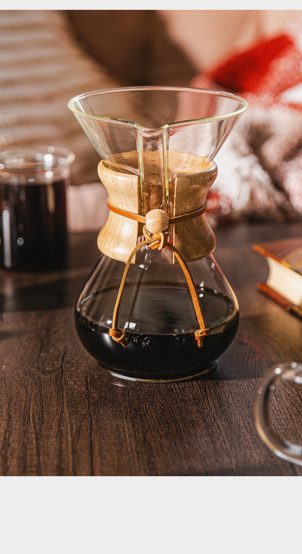 Chemex coffee maker with coffee on a wooden surface